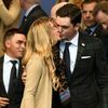 U.S. Team player Keegan Bradley kisses his partner Jillian Stacey during the opening ceremony of the 40th Ryder Cup at Gleneagles