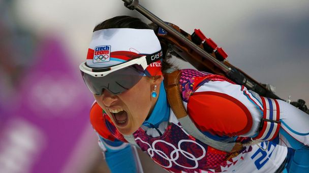 Czech Republic's Vitkova reacts after crossing finish line in women's biathlon 15km individual event at 2014 Sochi Winter Olympics