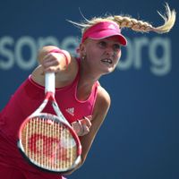 C. Garciaová, K. Mladenovičová Kristina Mladenovic of France hits a return to Petra Kvitova of the Czech Republic during their match at the 2014 U.S. Open tennis tournament in New York