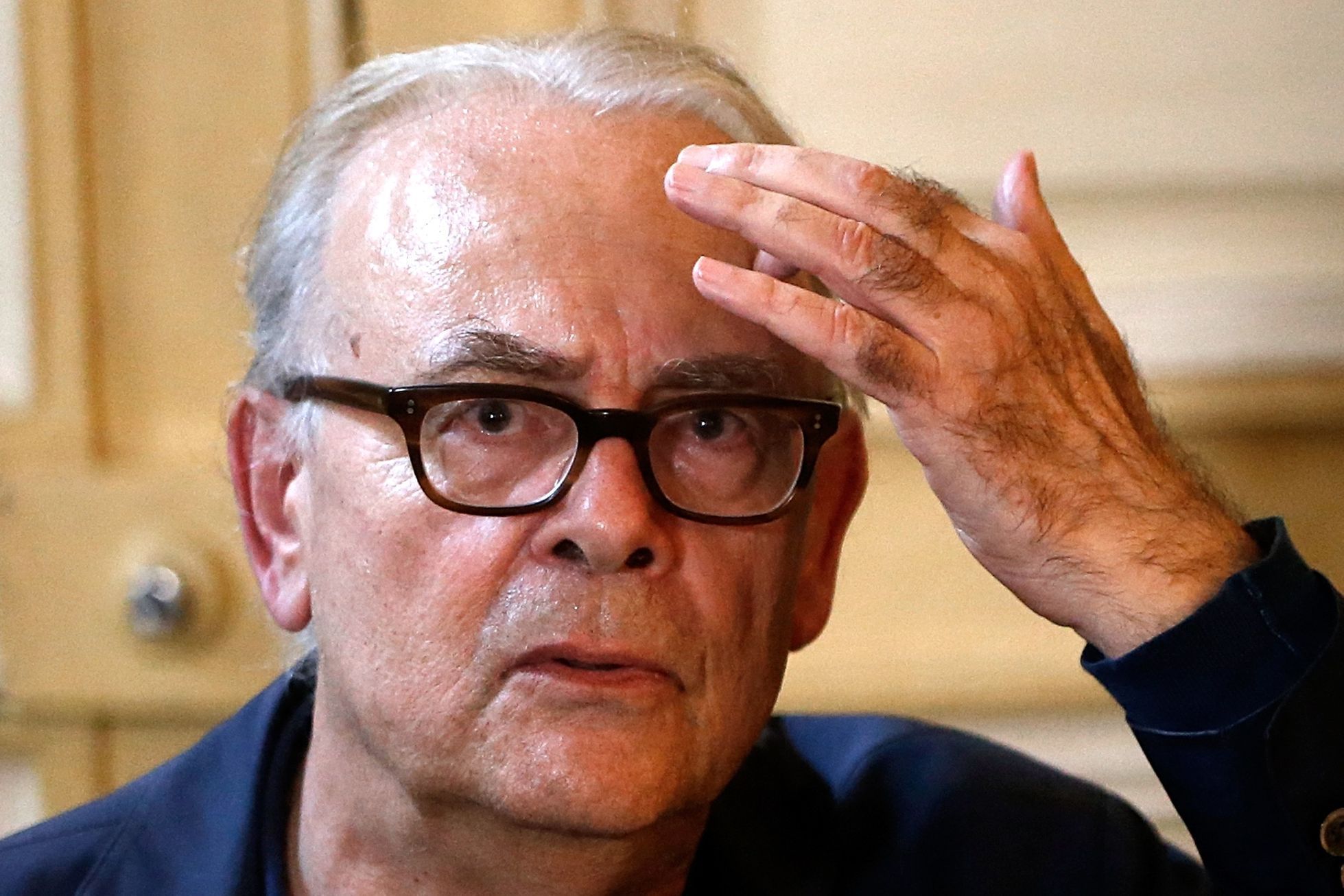 French writer Patrick Modiano speaks during a news conference at the French publishing house Gallimard in Paris