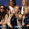Wives and partners Sybi Kuchar, Kandi Mahan and Amy Mickelson of U.S. Team players, sit together for the opening ceremony of the 40th Ryder Cup at Gleneagles