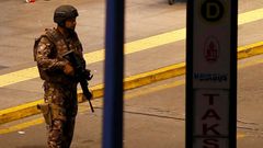 Armed security walks at Turkey's largest airport, Istanbul Ataturk