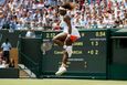 Serena Williams of the U.S. jumps as she reacts during her women's singles tennis match against Caroline Garcia of France at the Wimbledon Tennis Championships, in London