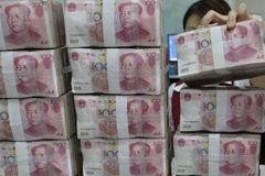 Čína devalvovala měnu, kurz klesl nejvíc za dvě desetiletí