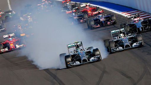 Mercedes Formula One driver Nico Rosberg of Germany leads next to Mercedes Formula One driver Lewis Hamilton of Britain (R) after the start of the first Russian Grand Pri