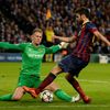 Manchester City's goalkeeper Joe Hart blocks Barcelona's Cesc Fabregas during their Champions League round of 16 first leg soccer match at the Etihad Stadium in Manchester