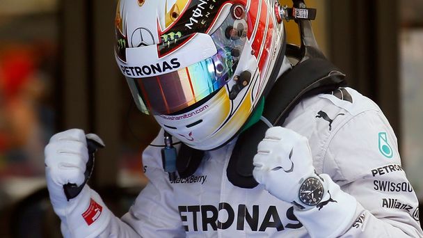 Mercedes Formula One driver Lewis Hamilton celebrates after taking the pole position at the qualifying session of the Spanish F1 Grand Prix at the Barcelona-Catalunya Circuit in Montmelo