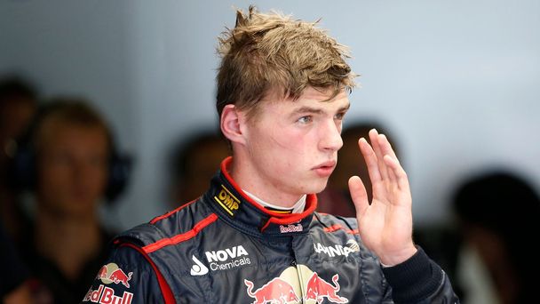 Toro Rosso Formula One driver Verstappen of the Netherlands returns to the garage after his car stalled on the track during the first practice session of the Japanese F1 Grand Prix at the Suzuka Circu