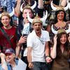 Cinema fans wearing Viking helmets react as they wait for arrivals in front of the Festival Palace before the screening of the film &quot;How to Train Your Dragon 2&quot; out of competition at the 67t