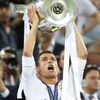Real Madrid's Cristiano Ronaldo celebrates with the trophy after winning the UEFA Champions League