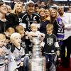 Los Angeles Kings' Dustin Brown puts daughter Mackenzie in the Stanley Cup after NHL Stanley Cup Finals in Los Angeles