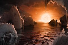 Vědci objevili soustavu planet, na nichž může být voda i život. Obíhají kolem červeného trpaslíka