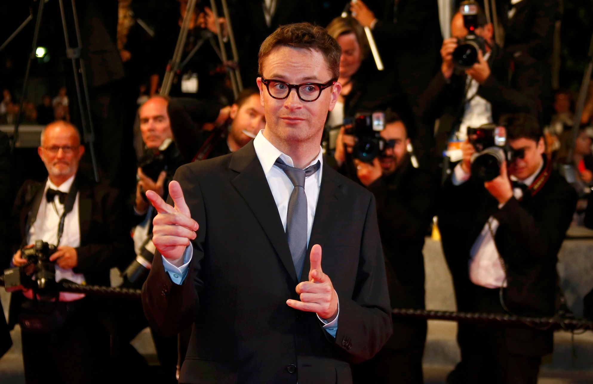 Jury member director Nicolas Winding Refn pose on the red carpet as he arrives for the screening of the film &quot;Captives&quot; in competition at the 67th Cannes Film Festival in Cannes