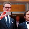 Jury members director Nicolas Winding Refn and actor and director Gael Garcia Bernal pose on the red carpet for the opening ceremony of the 67th Cannes Film Festival in Cannes