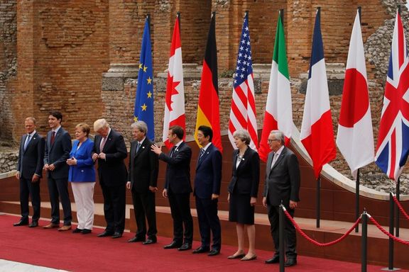 Summit lídrů G7: (zleva) Donald Tusk, Justin Trudeau, Angela Merkelová, Donald Trump, Paolo Gentiloni, Emmanuel Macron, Šinzó Abe, Theresa Mayová a Jean-Claude Juncker.