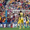 Atletico Madrid's Godin heads the ball to score against Barcelona during their Spanish first division soccer match in Barcelona