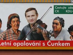 Tanning with Čunek and travel for free with KDU ČSL billboard referring to one of Čunek´s racist remarks