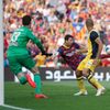Atletico Madrid's goalkeeper Courtois watches as Barcelona's Messi kicks to score a goal that was later disallowed during their Spanish first division match in Barcelona