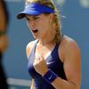 Canada's Eugenie Bouchard celebrates her win Olga Govortsova of Belarus during their match at the 2014 U.S. Open tennis tournament in New York