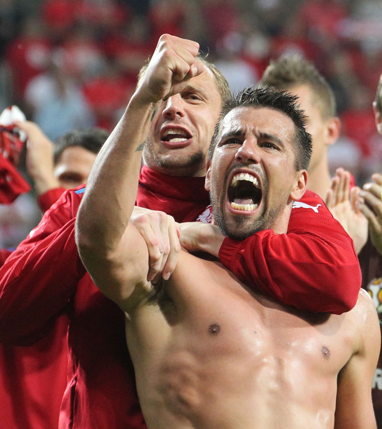 Český fotbalista Milan Baroš slaví vítězství s Polskem v utkání skupiny A na Euru 2012