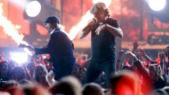 Johnson and Young of AC/DC perform a medley of songs to open the show at the 57th annual Grammy Awards in Los Angeles