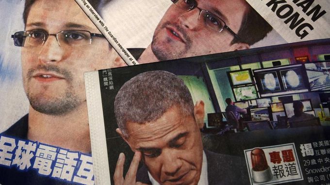 Photos of Edward Snowden, a contractor at the National Security Agency (NSA), and U.S. President Barack Obama are printed on the front pages of local English and Chinese