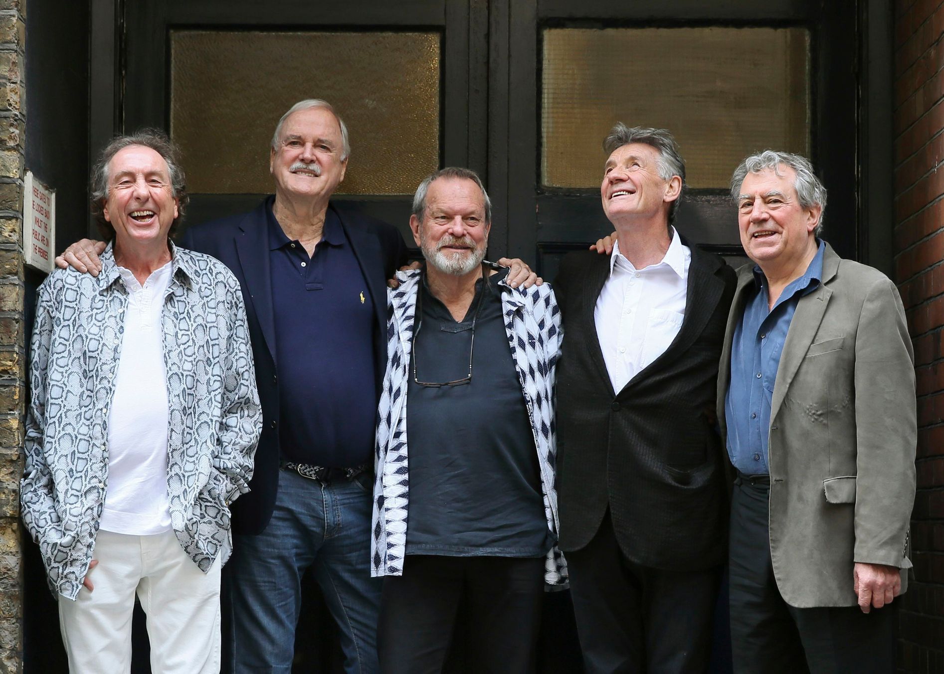 Members of British comedy troupe Monty Python pose for a photograph during a media event in central London