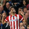 Atletico Madrid's Costa celebrates after scoring a penalty shot for the team during their Champions League semi-final second leg soccer match against Chelsea at Stamford Bridge Stadium in London