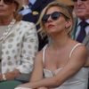 Actor Sienna Miller on Centre Court at the Wimbledon Tennis Championships in London