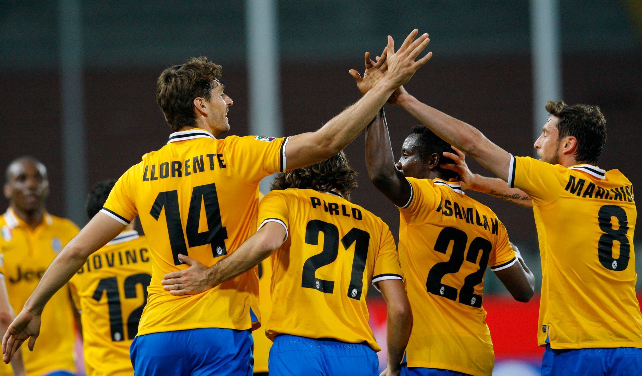 Juventus' Llorente celebrates with his team mates Pirlo, Asamoah and Marchisio, after scoring a goal against Udineseduring their Italian Serie A soccer match in Udine