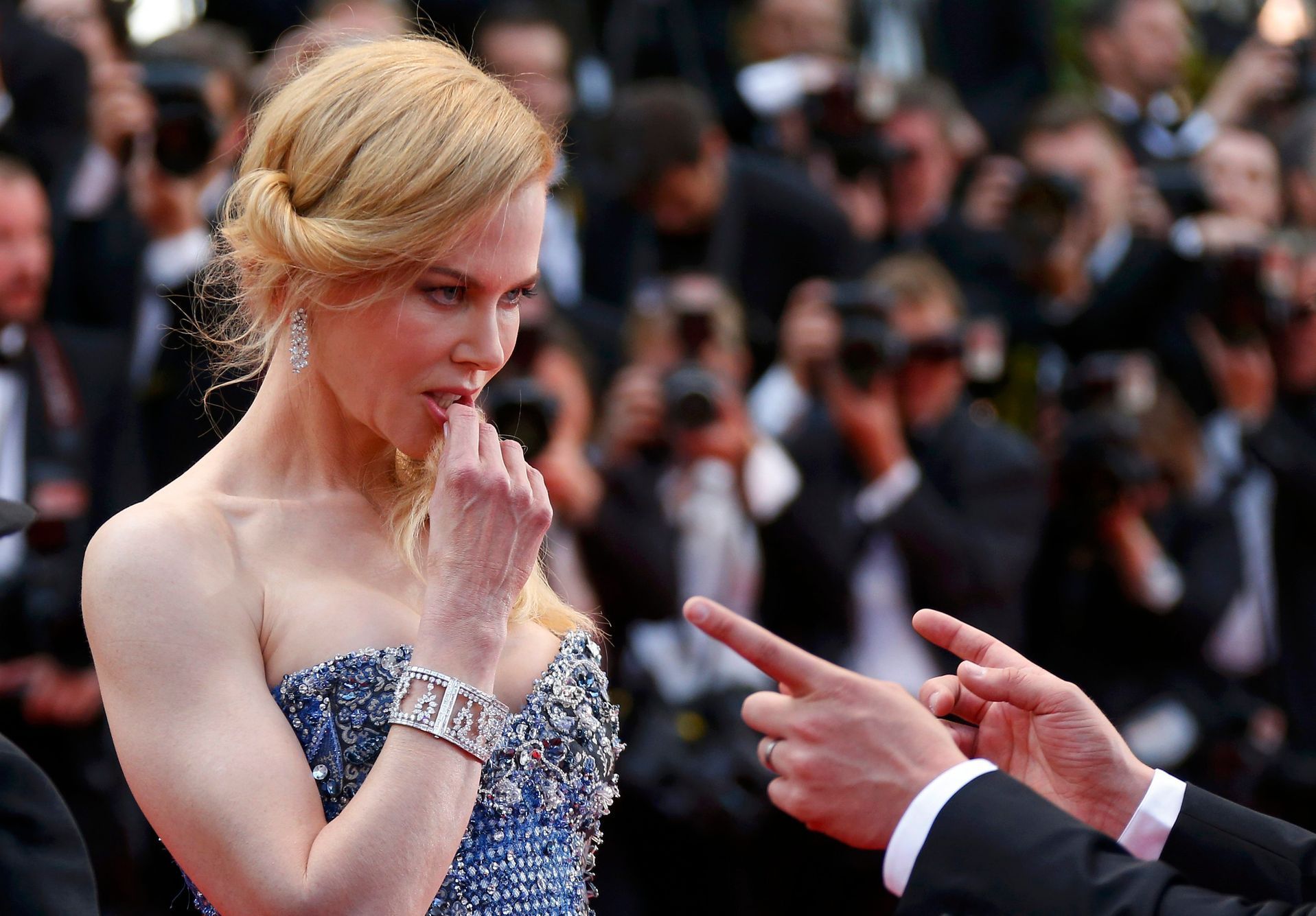 Cast member Nicole Kidman poses on the red carpet as she arrives for the opening ceremony and the screening of the film &quot;Grace of Monaco&quot; out of competition during the 67th Cannes Film Festi