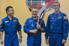 Olympijská pochodeň je na ISS, v kosmu ji ale nezapálí