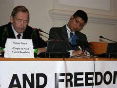Min Zin sitting next to ex-president Václav Havel at a seminar Dissidents and Freedom held at the Czech Ministry of Foreign Affairs