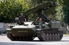 Spy agency “addressing” threat of Czech fighters in Ukraine