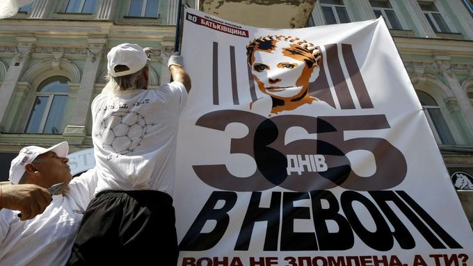 Poster displaying Tymoshenko's photo and saying "360 days in captivity"