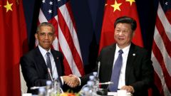 Si Ťin-pching a Barack Obama na COP21