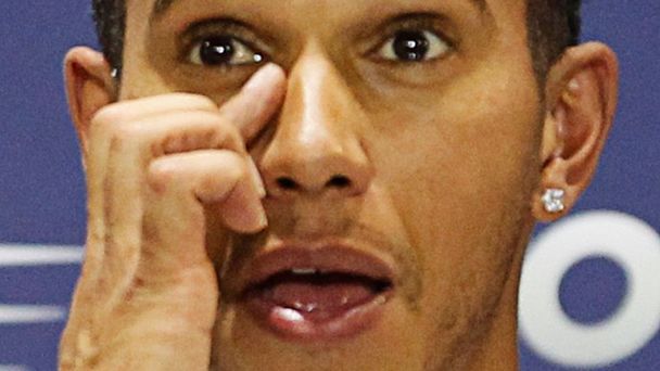 Mercedes Formula One driver Lewis Hamilton of Britain reacts after winning the Bahrain F1 Grand Prix at the Bahrain International Circuit (BIC) in Sakhir