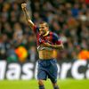 Barcelona's Dani Alves celebrates after scoring Barcelona's second goal against Manchester City during their Champions League round of 16 first leg soccer match at the Etihad Stadium in Manchester,