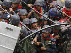 Burmese soldiers during last September's violent suppression of peaceful demonstrations in Rangoon. Various sources put the number of victims of the crackdown between thirty and two hundred