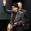 Zpěvák Elvis Costello při prezentaci nových produktů Apple