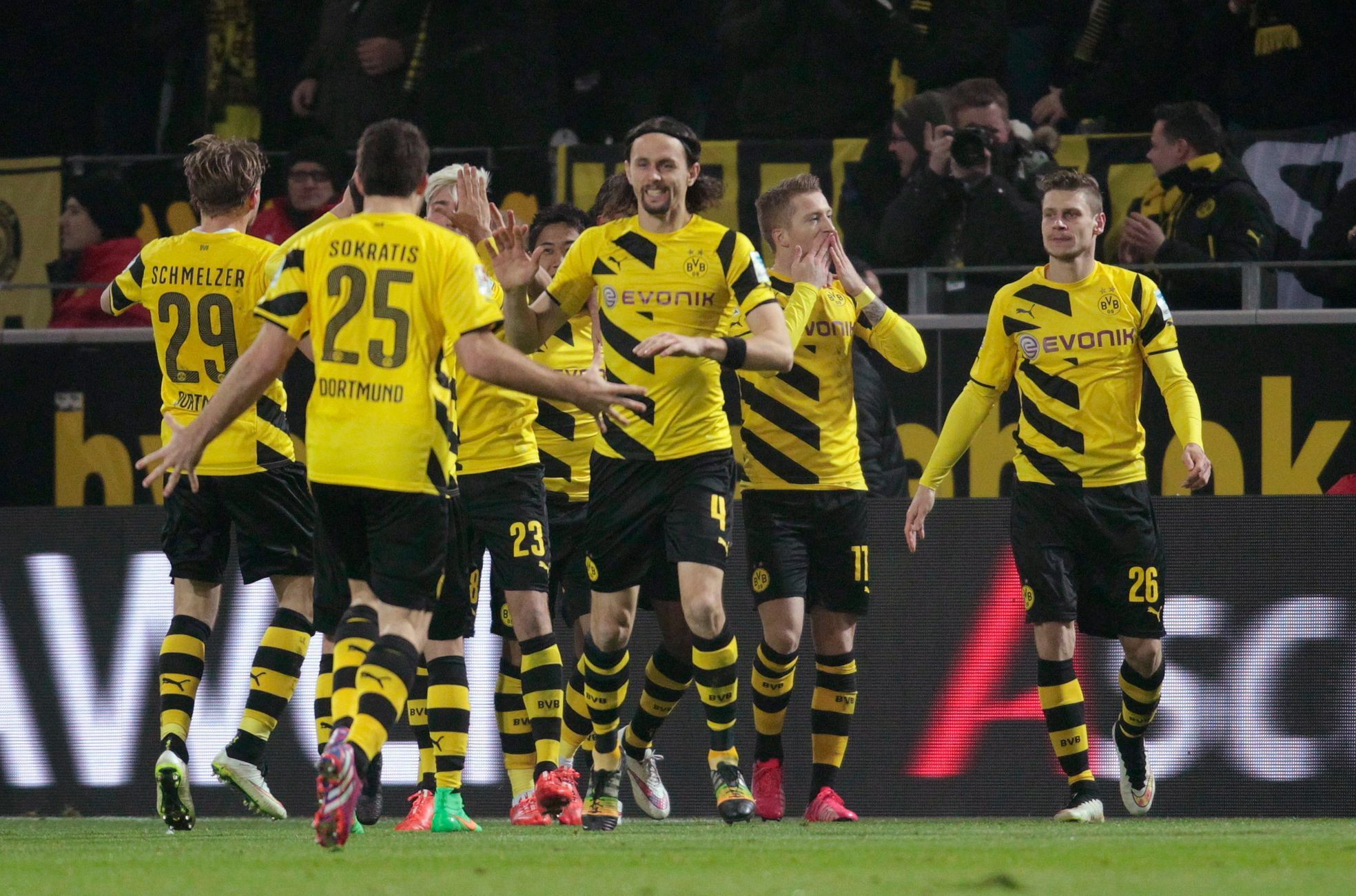 Borussia Dortmund's players celebrate a goal against Mainz 05 during their Bundesliga first division soccer match in Dortmund