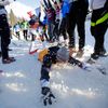 France's Duvillard slides in snow as he celebrates after men's cross-country 4 x 10km relay event at Sochi 2014 Winter Olympics