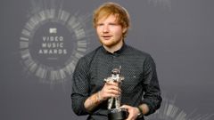 Singer Ed Sheeran poses backstage after winning the award for best male video for &quot;Sing&quot; during the 2014 MTV Video Music Awards in Inglewood