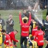 Atletico Madrid's team members celebrate, spraying champagne, after winning their Spanish First Division soccer match against Barcelona, and the league title, in Barcelona