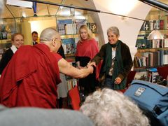Let's rock'n'roll! Typical Forum 2000. Where Dalai Lama meets Joan Baez