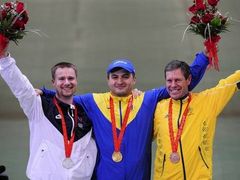 Matthew Emmons (left) and other medallists after the 50m rifle prone event in Beijing