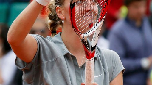 Petra Kvitova of the Czech Republic reacts after winning her women's singles match against Marina Erakovic of New Zealand at the French Open tennis tournament at the Rola