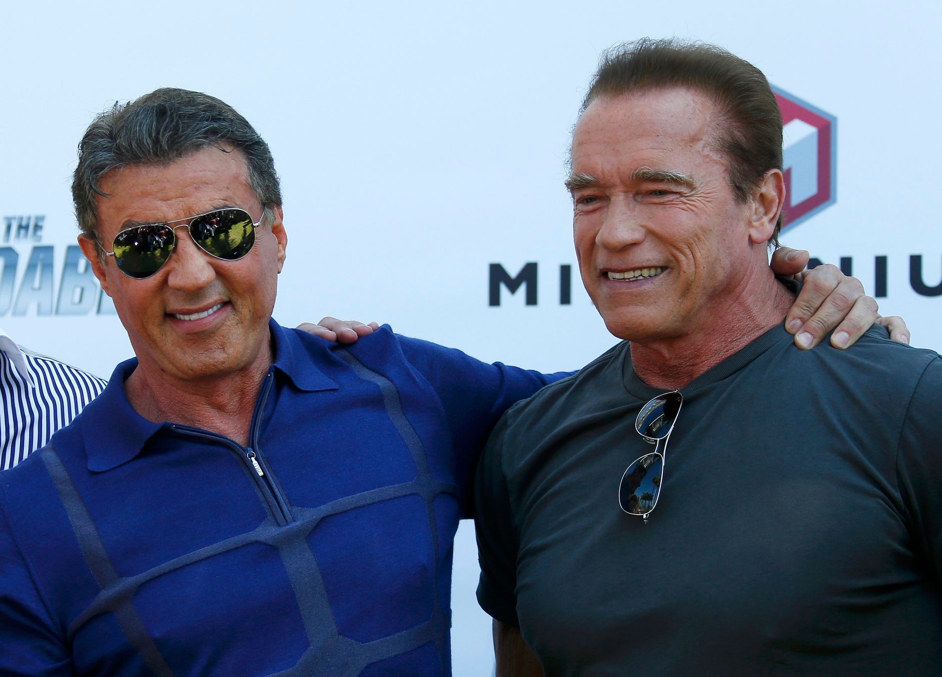 Cast members Sylvester Stallone and Arnold Schwarzenegger pose during a photocall on the Croisette to promote the film &quot;The Expendables 3&quot; during the 67th Cannes Film Festival in Cannes