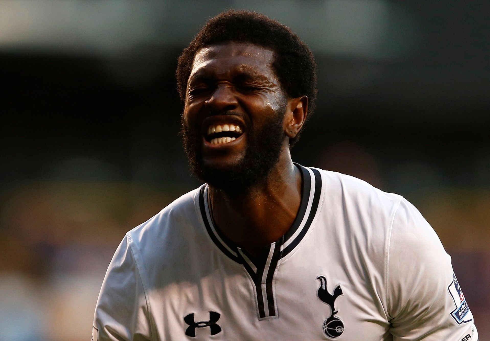 Tottenham Hotspur's Adebayor reacts after missing a chance to score against Arsenal during their English Premier League soccer match in London