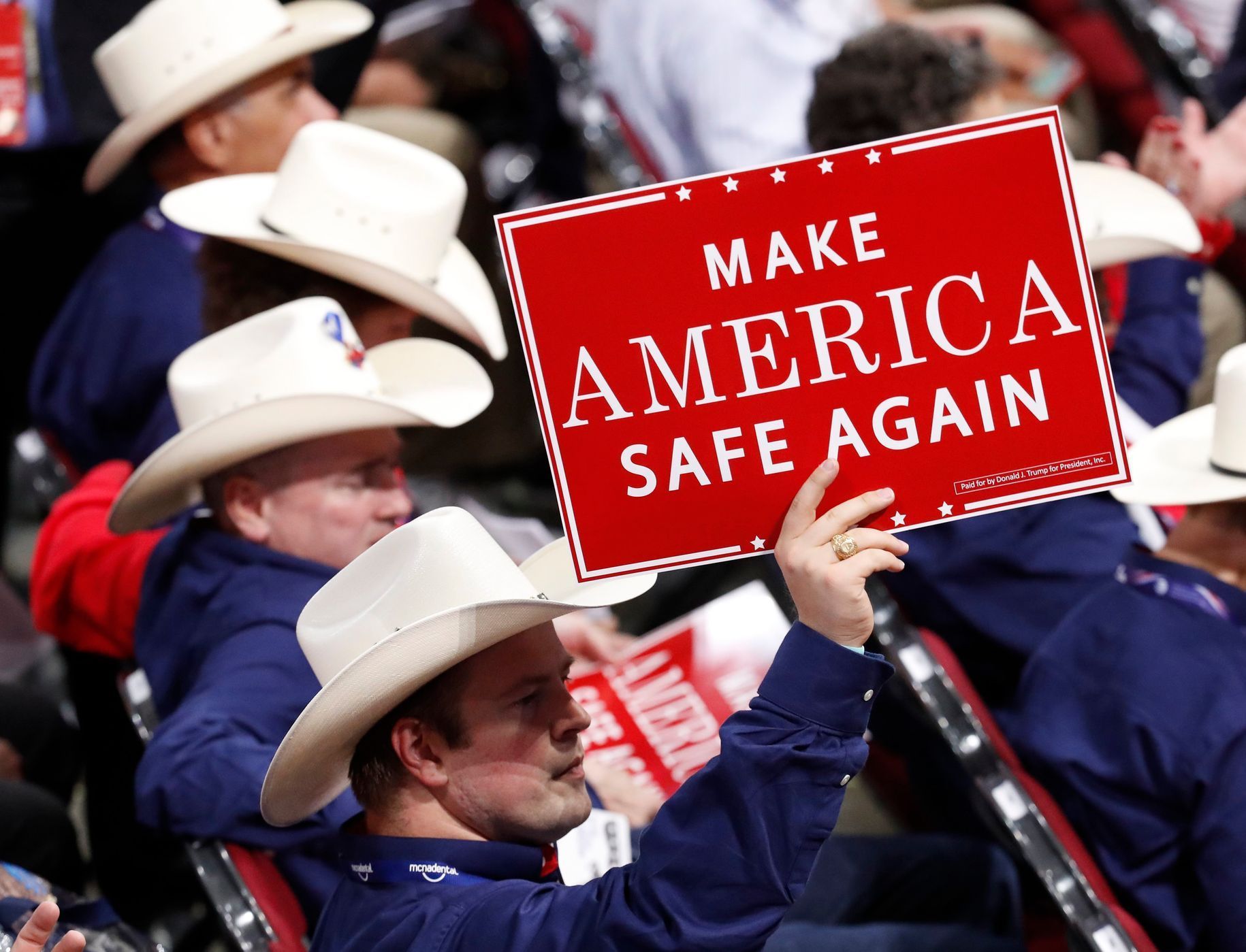A delegate from Texas holds up a sign at the Republican National Convention in Cleveland